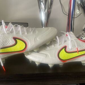 Nike Kids White Soccer Cleats with Neon Yellow and Red Accents